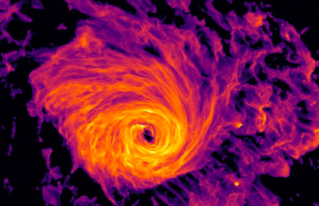 A galaxy simulated within a large cosmological simulation seen in H-alpha light, tracing star formation.