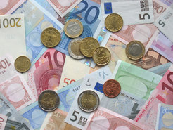 Bank accounts. Much neater than this unwieldy heap of cash.