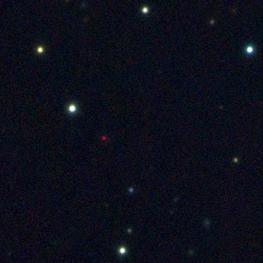 Multicolor Pan-STARRS1 image of the free-floating planet PSO J318.5-22 (red object near the center) in the constellation of Capricornus. The planet is extremely cold and faint, about 100 billion times fainter in optical light than the planet Venus. Most of its energy is emitted at infrared wavelengths. The image is 125 arcseconds on a side.