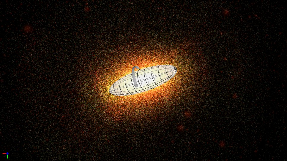Kosmische Spindel. Diese elliptische Galaxie ist zigarrenförmig, und ähnlich wie bei einer Spindel rotiert sie im Mittel um ihre Längsachse. Das Hintergrundbild ist ein Schnappschuss einer Simulation von A. Tsatsi und Kollegen.