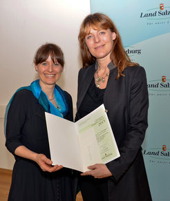 Doppler-Award presented to L. Kaltenegger by Member of Salzburg Government, Mag. Martina Berthold