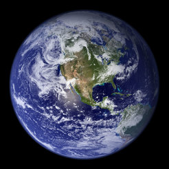 Fig. 2: In this composite satellite image from NASA, you can see a greenish tint in the reflected sunlight, a direct signature of plant life present on Earth's surface. Similarly, if microbial life with a particular pigmentation covered larges swathes of an exoplanet's surface, its presence could in principle be measured directly through its tint in reflected starlight viewed through our telescopes.