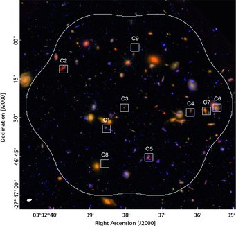 Figure 2: Hubble Ultra Deep Field, with the locations of the ten galaxies detected in the millimeter regime marked. (One of the locations, C2 contains two galaxies directly behind each other.) Figure 2: Hubble Ultra Deep Field, with the locations of the ten galaxies detected in the millimeter regime marked. (One of the locations, C2 contains two galaxies directly behind each other.)