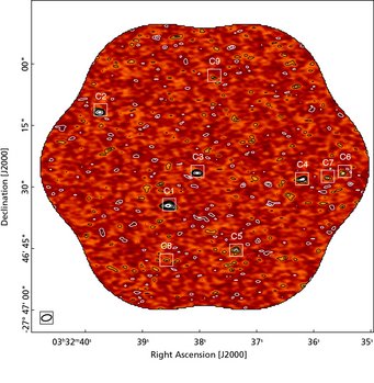 Figure 3: ALMA 1.2-mm signal-to-noise continuum mosaic map obtained in the HUDF. Black and white contours show positive and negative brightness, respectively. (Negative values are an artefact of the measurement principle of ALMA, which is not sensitive to flux on larger-size scales.) Contours indicate a brightness of 12.7 μJy per beam times ±2, 3, 4, 5, 8, 12, 20 and 40. The boxes show the position of the sources detected. C2 contains two of the galaxies. Figure 3: ALMA 1.2-mm signal-to-noise continuum mosaic map obtained in the HUDF. Black and white contours show positive and negative brightness, respectively. (Negative values are an artefact of the measurement principle of ALMA, which is not sensitive to flux on larger-size scales.) Contours indicate a brightness of 12.7 μJy per beam times ±2, 3, 4, 5, 8, 12, 20 and 40. The boxes show the position of the sources detected. C2 contains two of the galaxies.