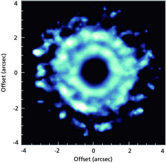 The protoplanetary disk around the young star TW Hydrae. Left image uses light from a spectral line of carbon monosulfide (CS), right image light scattered by dust particles in the disk. The protoplanetary disk around the young star TW Hydrae. Left image uses light from a spectral line of carbon monosulfide (CS), right image light scattered by dust particles in the disk.