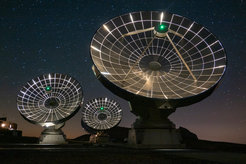 The NOEMA antennas at night.