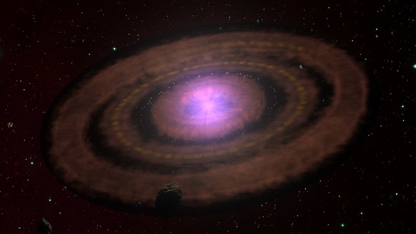 This artistic impression illustrates what planet-forming disks around young stars often look like. They initially consist of dust and gas configured into rings of dense material. In time, the solid components grow into pebbles which eventually can evolve into planets. Since the ALMA observations used in this study are only sensitive to millimetre-sized dust grains, evolved disks with larger objects or even planets produce a relatively faint signal from the remnant material. The new results indicate that without external irradiation, such disks evolve similarly. After about a million years, most of them do not have enough mass to produce large planets like Jupiter. However, such planets may already have formed there. Artistic impression of a planet-forming disk