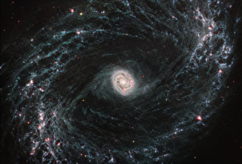 NGC 1433 is a barred spiral galaxy with a particularly bright core surrounded by double star forming rings. For the first time, in JWST’s infrared images, scientists can see cavernous bubbles of gas where forming stars have released energy into their surrounding environment. In the image of NGC 1433, blue, green, and red were assigned to MIRI’s data at 7.7, 10.0 and 11.3, and 21.0 microns, respectively.