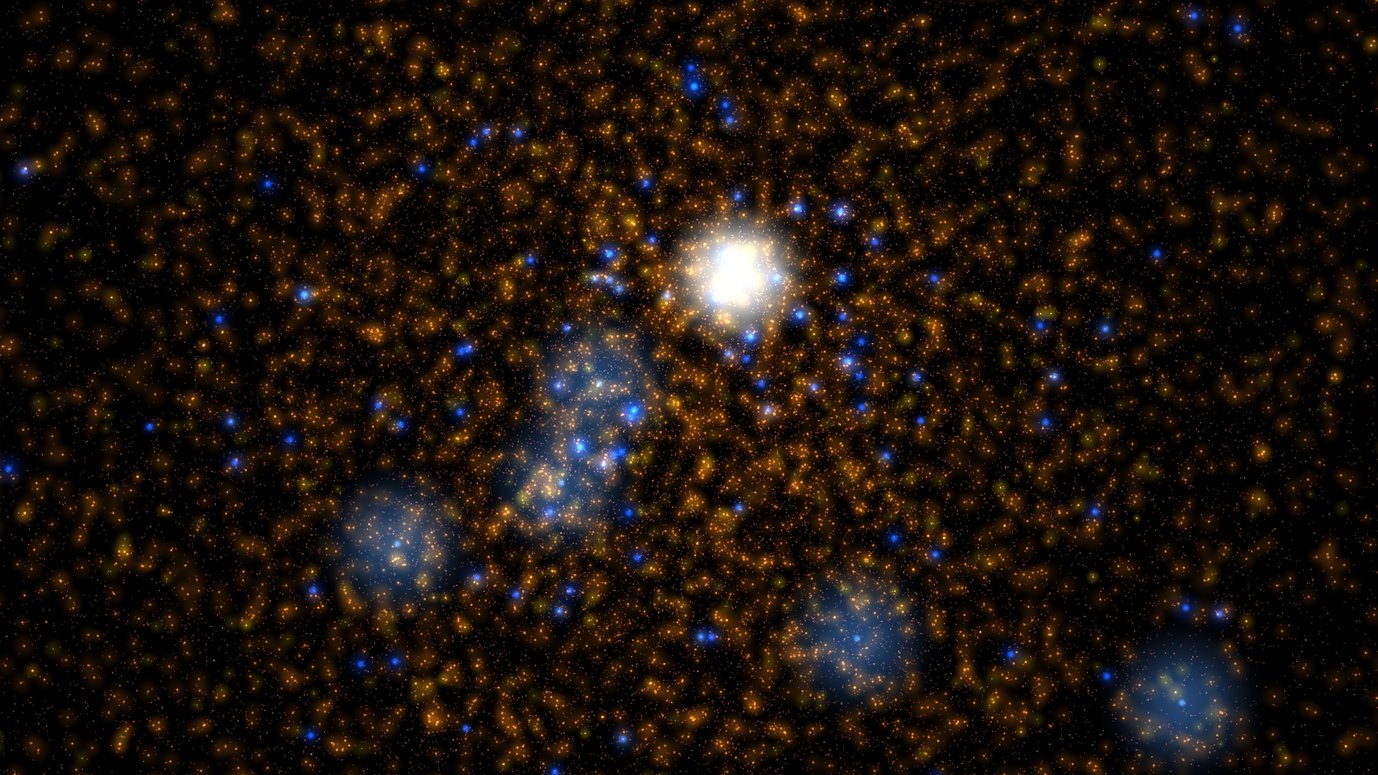 The image shows a field of many orange as well as blue dots. In the centre is a bright white circle that occupies about one ninth of the height of the image.