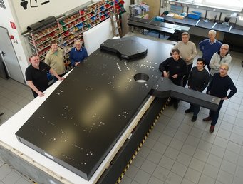 The "MICADO Relay Optics Bench" completed by CarbonVision during acceptance by the MPIA MICADO team. From left to right:Alexander Deckert (Production Manager Carbon-Werke), Ralph Hofferbert (MPIA) , Franz Weißgerber (Company founder Carbon Werke), Wolfgang Thum (Assembly Carbon-Werke), Wolfram Schlossmacher (Managing Director CarbonVision), Santiago Barboza (MPIA), Friedrich Müller (MPIA), Ralf-Rainer Rohloff (MPIA), Helmut Espig (Design CarbonVision). The "MICADO Relay Optics Bench" completed by CarbonVision during acceptance by the MPIA MICADO team. From left to right:Alexander Deckert (Production Manager Carbon-Werke), Ralph Hofferbert (MPIA) , Franz Weißgerber (Company founder Carbon Werke), Wolfgang Thum (Assembly Carbon-Werke), Wolfram Schlossmacher (Managing Director CarbonVision), Santiago Barboza (MPIA), Friedrich Müller (MPIA), Ralf-Rainer Rohloff (MPIA), Helmut Espig (Design CarbonVision).