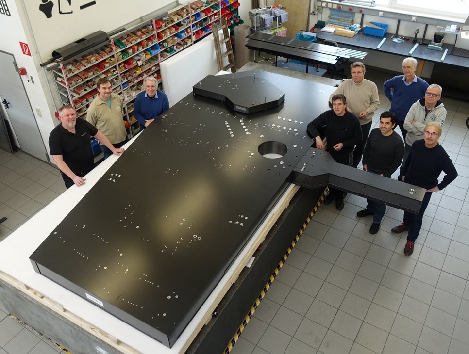 The "MICADO Relay Optics Bench" completed by CarbonVision during acceptance by the MPIA MICADO team. From left to right:Alexander Deckert (Production Manager Carbon-Werke), Ralph Hofferbert (MPIA) , Franz Weißgerber (Company founder Carbon Werke), Wolfgang Thum (Assembly Carbon-Werke), Wolfram Schlossmacher (Managing Director CarbonVision), Santiago Barboza (MPIA), Friedrich Müller (MPIA), Ralf-Rainer Rohloff (MPIA), Helmut Espig (Design CarbonVision).