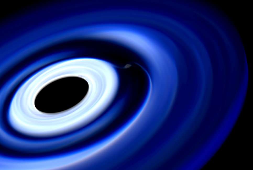 Beispiel für eine Simulationsrechnung, die in einer protoplanetaren Scheibe einen jungen Planeten zeigt, der Materie aufsammelt.