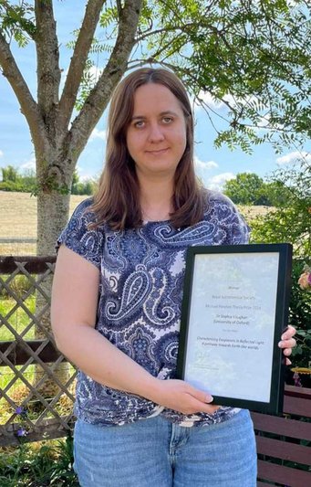 Sophia Vaughan with the Royal Astronomical Society award certificate Sophia Vaughan
